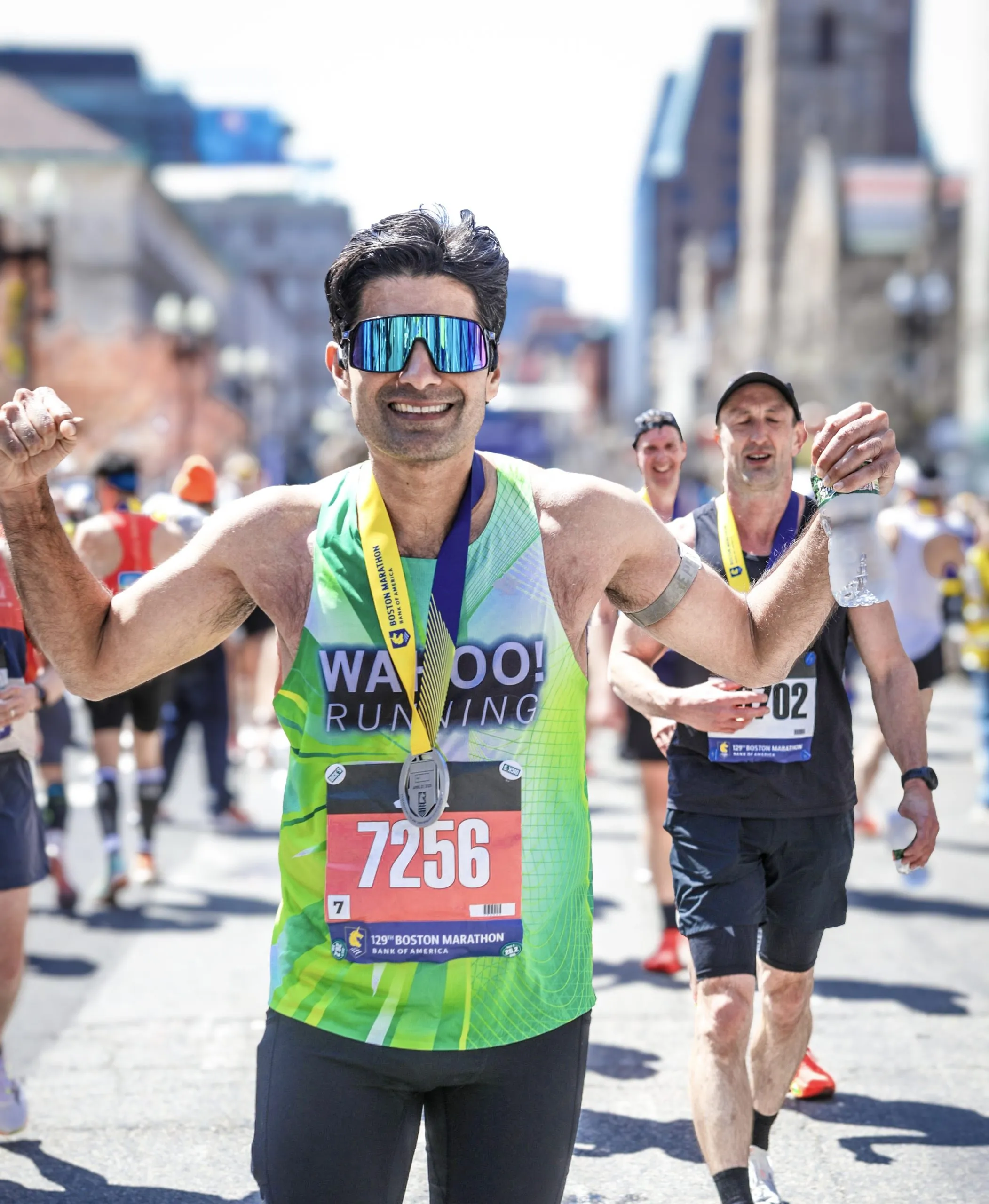 A WAHOO! runner celebrating mid-race